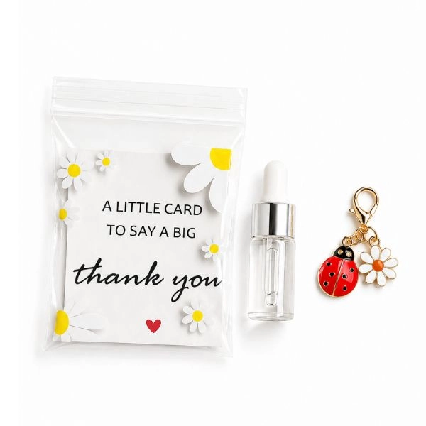 Darilno pakiranje Cuticle Oil Almond + obesek za ključe